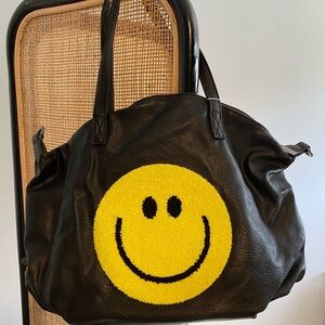 Black Shoulder Bag with Yellow Smiley Accent